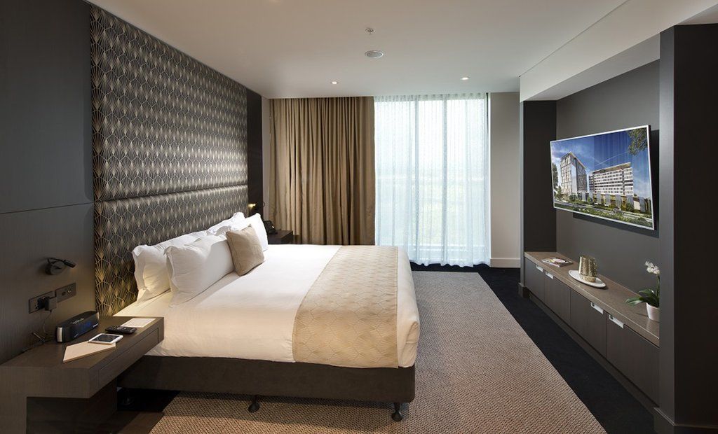 Pullman Brisbane Airport Otel Dış mekan fotoğraf A bedroom at the hotel